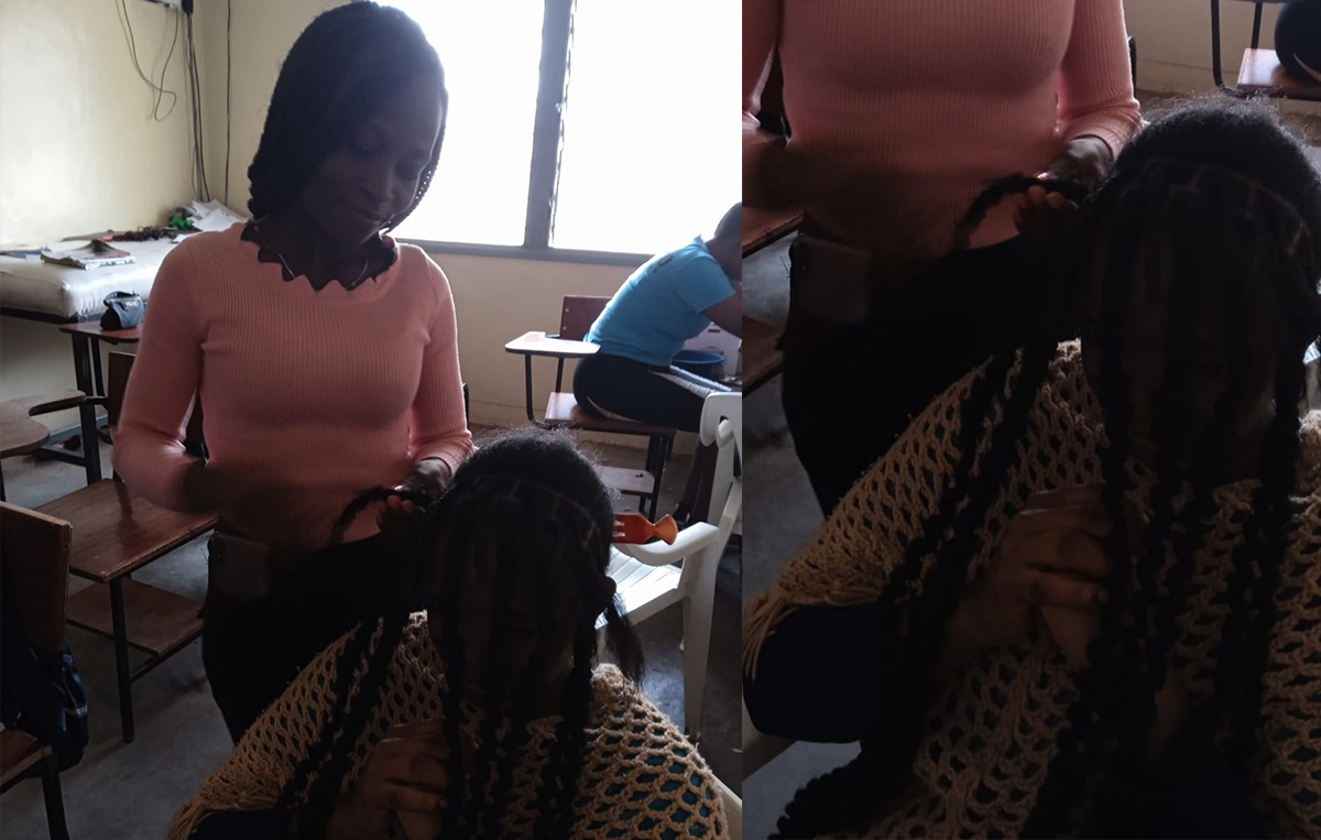 Grace Onyango working on a client’s hair