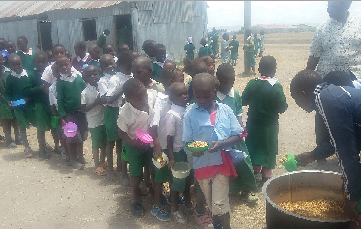 Students queing for their lunch at Ngalalya Primary School